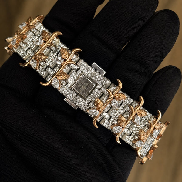 Platonic VVS SYNDICATE Regalia luxury wristwatch with rose gold leaf motifs, diamond-encrusted links, and thorn bezel.